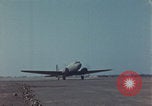 Image of Douglas DC-3 take off Iwo Jima, 1945, second 10 stock footage video 65675080623