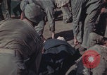 Image of US Marines wounded Iwo Jima, 1945, second 52 stock footage video 65675080624