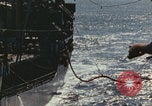Image of USS Saratoga refueling Pacific Ocean, 1945, second 33 stock footage video 65675080633