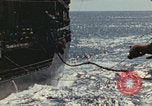 Image of USS Saratoga refueling Pacific Ocean, 1945, second 36 stock footage video 65675080633