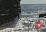 Image of USS Saratoga refueling Pacific Ocean, 1945, second 37 stock footage video 65675080633