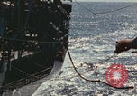 Image of USS Saratoga refueling Pacific Ocean, 1945, second 41 stock footage video 65675080633