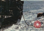 Image of USS Saratoga refueling Pacific Ocean, 1945, second 42 stock footage video 65675080633