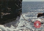 Image of USS Saratoga refueling Pacific Ocean, 1945, second 44 stock footage video 65675080633