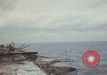 Image of USS Saratoga sailors clearing debris Pacific Ocean, 1945, second 9 stock footage video 65675080635