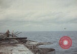Image of USS Saratoga sailors clearing debris Pacific Ocean, 1945, second 11 stock footage video 65675080635