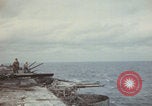Image of USS Saratoga sailors clearing debris Pacific Ocean, 1945, second 12 stock footage video 65675080635