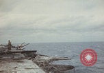 Image of USS Saratoga sailors clearing debris Pacific Ocean, 1945, second 13 stock footage video 65675080635