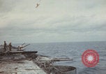 Image of USS Saratoga sailors clearing debris Pacific Ocean, 1945, second 14 stock footage video 65675080635