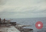 Image of USS Saratoga sailors clearing debris Pacific Ocean, 1945, second 15 stock footage video 65675080635