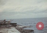Image of USS Saratoga sailors clearing debris Pacific Ocean, 1945, second 16 stock footage video 65675080635