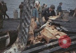 Image of USS Saratoga sailors clearing debris Pacific Ocean, 1945, second 31 stock footage video 65675080635