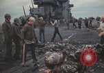 Image of USS Saratoga sailors clearing debris Pacific Ocean, 1945, second 34 stock footage video 65675080635