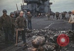 Image of USS Saratoga sailors clearing debris Pacific Ocean, 1945, second 36 stock footage video 65675080635