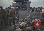 Image of USS Saratoga sailors clearing debris Pacific Ocean, 1945, second 37 stock footage video 65675080635