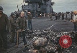 Image of USS Saratoga sailors clearing debris Pacific Ocean, 1945, second 38 stock footage video 65675080635