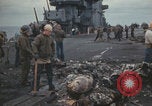 Image of USS Saratoga sailors clearing debris Pacific Ocean, 1945, second 42 stock footage video 65675080635