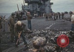 Image of USS Saratoga sailors clearing debris Pacific Ocean, 1945, second 43 stock footage video 65675080635