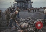 Image of USS Saratoga sailors clearing debris Pacific Ocean, 1945, second 44 stock footage video 65675080635