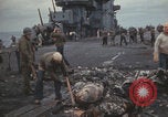 Image of USS Saratoga sailors clearing debris Pacific Ocean, 1945, second 46 stock footage video 65675080635