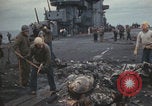 Image of USS Saratoga sailors clearing debris Pacific Ocean, 1945, second 47 stock footage video 65675080635
