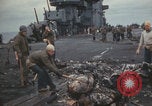 Image of USS Saratoga sailors clearing debris Pacific Ocean, 1945, second 49 stock footage video 65675080635