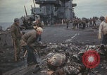 Image of USS Saratoga sailors clearing debris Pacific Ocean, 1945, second 50 stock footage video 65675080635