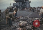Image of USS Saratoga sailors clearing debris Pacific Ocean, 1945, second 51 stock footage video 65675080635