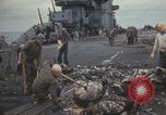 Image of USS Saratoga sailors clearing debris Pacific Ocean, 1945, second 53 stock footage video 65675080635