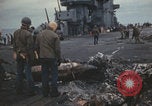 Image of USS Saratoga sailors clearing debris Pacific Ocean, 1945, second 57 stock footage video 65675080635