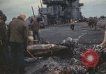 Image of USS Saratoga sailors clearing debris Pacific Ocean, 1945, second 61 stock footage video 65675080635