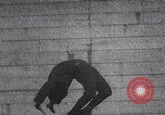 Image of boy doing acrobatic stunts New York City USA, 1898, second 5 stock footage video 65675080653