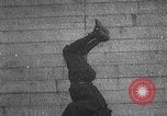 Image of boy doing acrobatic stunts New York City USA, 1898, second 11 stock footage video 65675080653