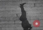 Image of boy doing acrobatic stunts New York City USA, 1898, second 13 stock footage video 65675080653
