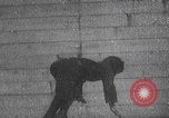 Image of boy doing acrobatic stunts New York City USA, 1898, second 20 stock footage video 65675080653