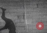 Image of boy doing acrobatic stunts New York City USA, 1898, second 28 stock footage video 65675080653