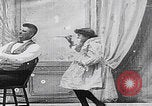 Image of little girl mischief United States USA, 1900, second 2 stock footage video 65675080662