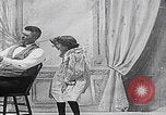 Image of little girl mischief United States USA, 1900, second 3 stock footage video 65675080662
