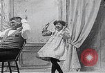 Image of little girl mischief United States USA, 1900, second 5 stock footage video 65675080662
