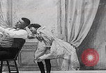 Image of little girl mischief United States USA, 1900, second 9 stock footage video 65675080662