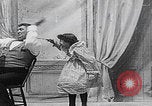 Image of little girl mischief United States USA, 1900, second 13 stock footage video 65675080662