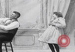 Image of little girl mischief United States USA, 1900, second 18 stock footage video 65675080662