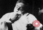 Image of old man shaving face United States USA, 1900, second 3 stock footage video 65675080678