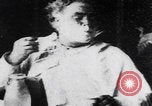 Image of old man shaving face United States USA, 1900, second 4 stock footage video 65675080678