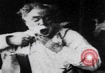 Image of old man shaving face United States USA, 1900, second 23 stock footage video 65675080678