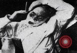 Image of old man shaving face United States USA, 1900, second 43 stock footage video 65675080678
