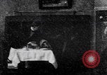 Image of couple perform magic tricks United States USA, 1900, second 4 stock footage video 65675080679