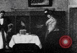 Image of couple perform magic tricks United States USA, 1900, second 5 stock footage video 65675080679