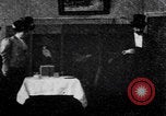 Image of couple perform magic tricks United States USA, 1900, second 7 stock footage video 65675080679