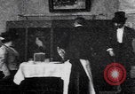 Image of couple perform magic tricks United States USA, 1900, second 10 stock footage video 65675080679